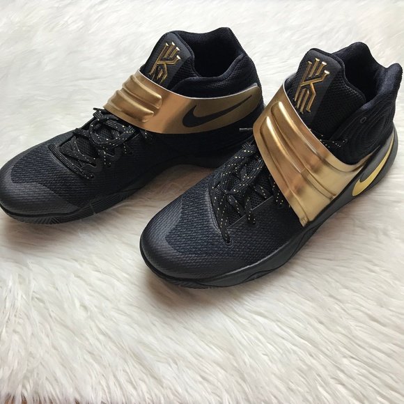 kyrie shoes black and gold